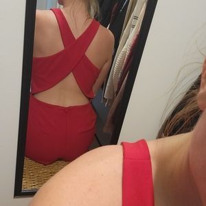 Red short romper with open cross back